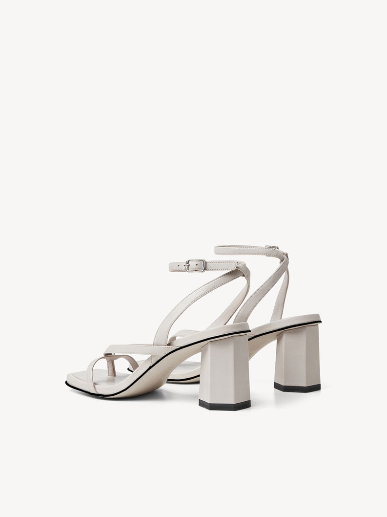 Pair of white leather sandals with wide block heel and strap